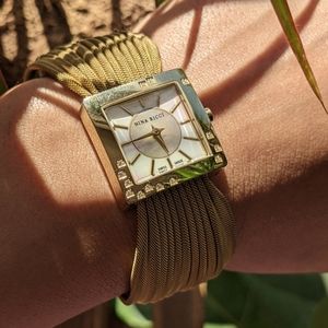 NINA RICCI gold plated diamond watch